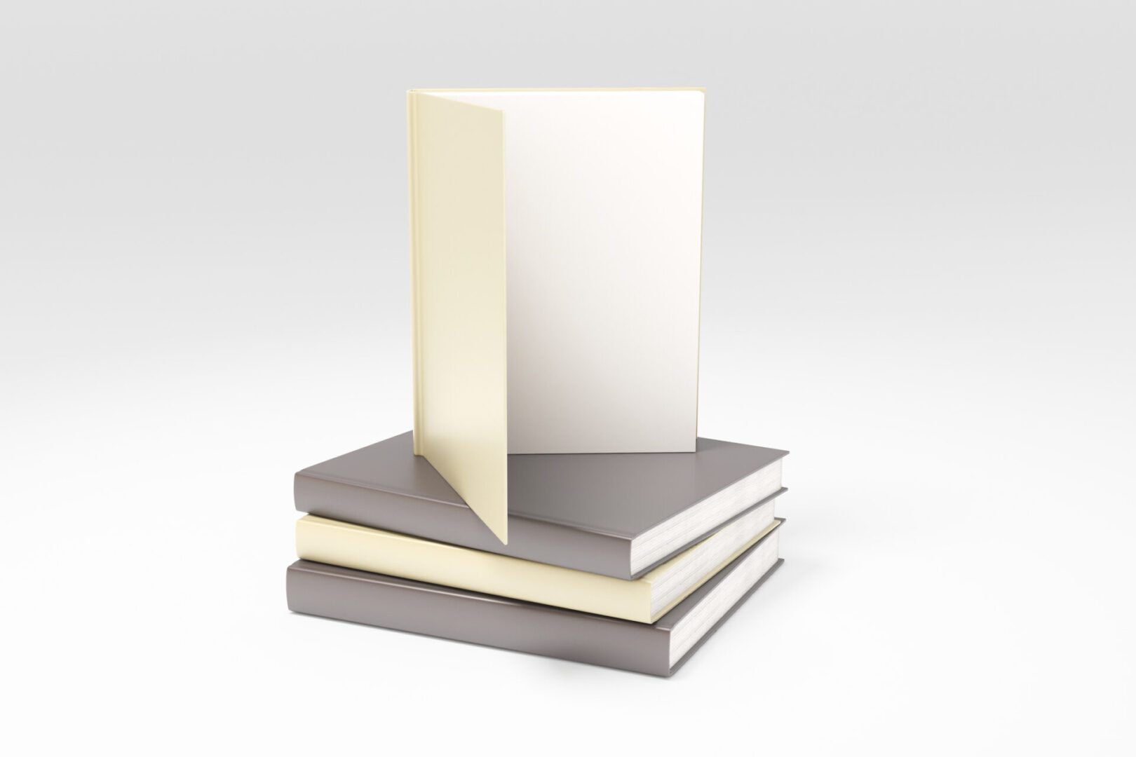 Blank book on top of stacked books