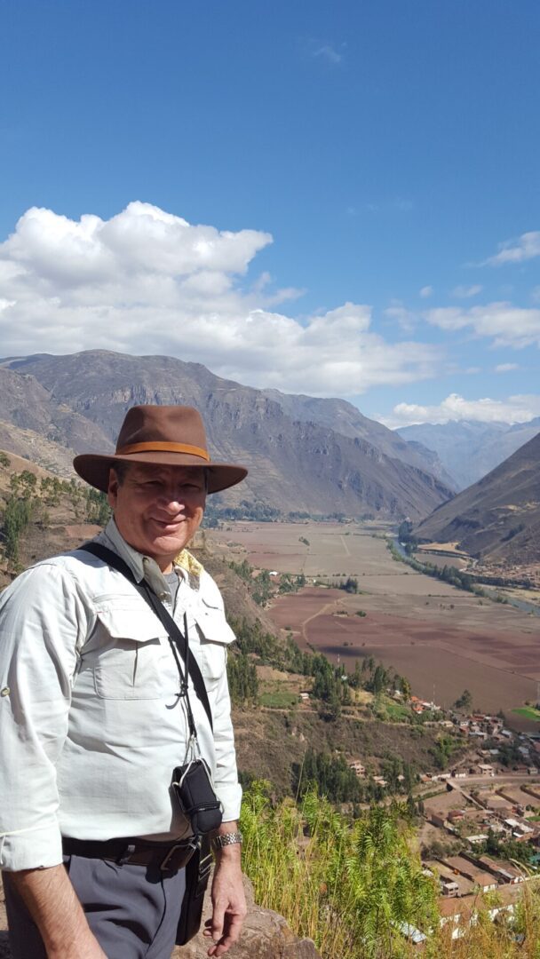 Traveler enjoying picturesque mountain vista